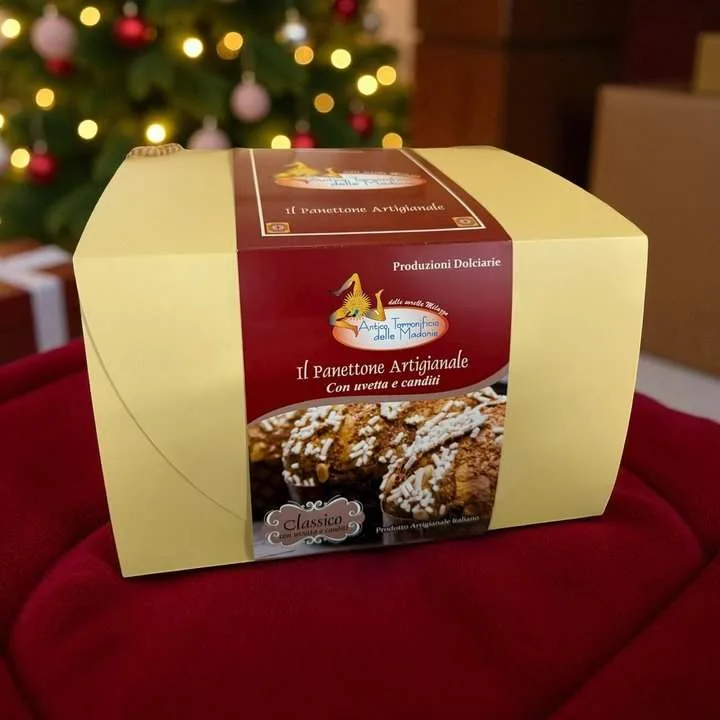 Il Panettone Artigianale classico con uvetta e canditi